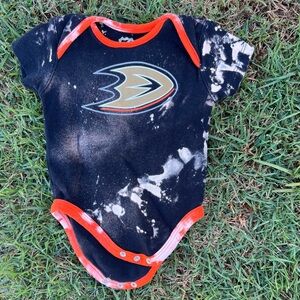 Black and orange tie-dye Anaheim Ducks baby onesie size 12M